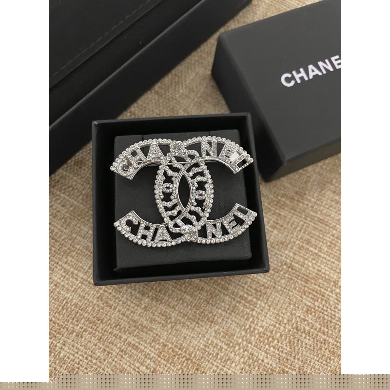 Ch*el brooches